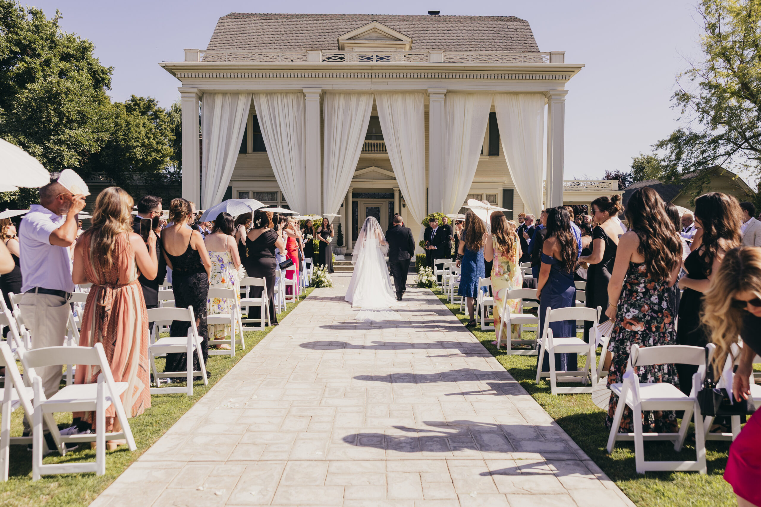Luxury Wedding Venue, Luxury Wedding Photographer Bride walking down the aisle at The Manor Estate, captured by Jessica Lynette Photography