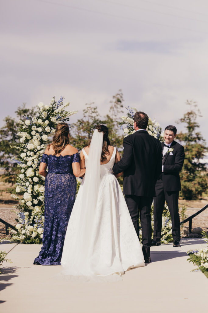 second shooter capturing groom’s emotional reaction during ceremony