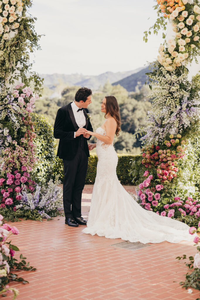 Ceremony arch and florals at Sherwood Country Club wedding editorial
