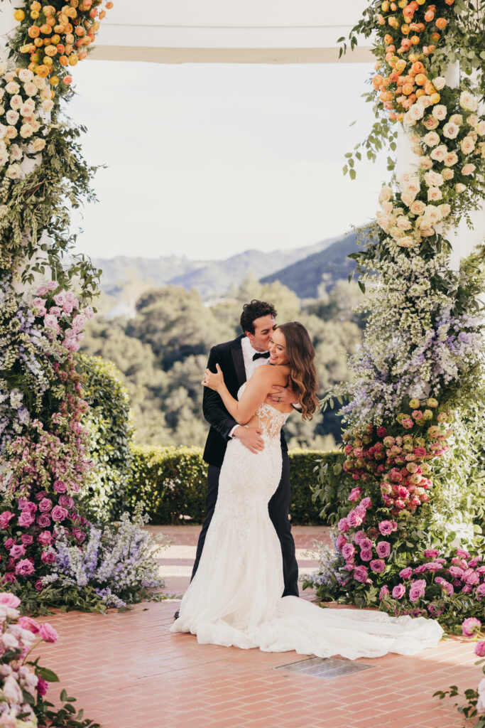Ceremony arch and florals at Sherwood Country Club wedding editorial

