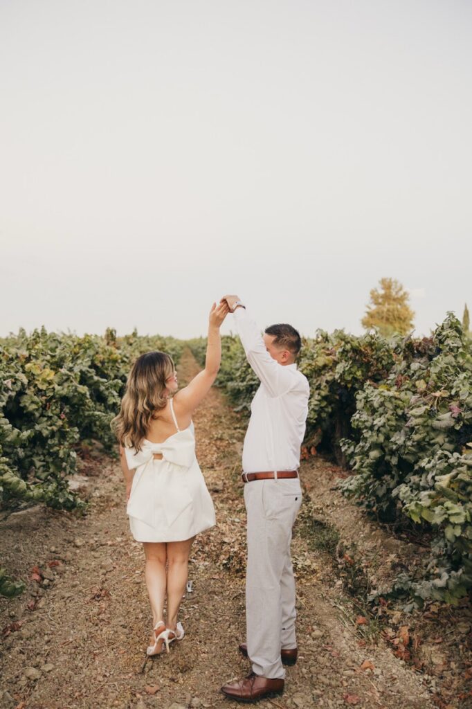 Romantic engagement portraits with vineyard views at Cardella Winery 